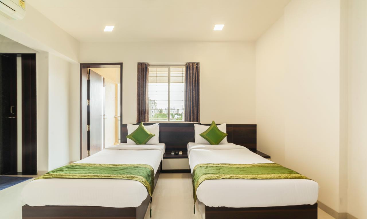 Hotel Treebo Trend Abode Nashik Esterno foto